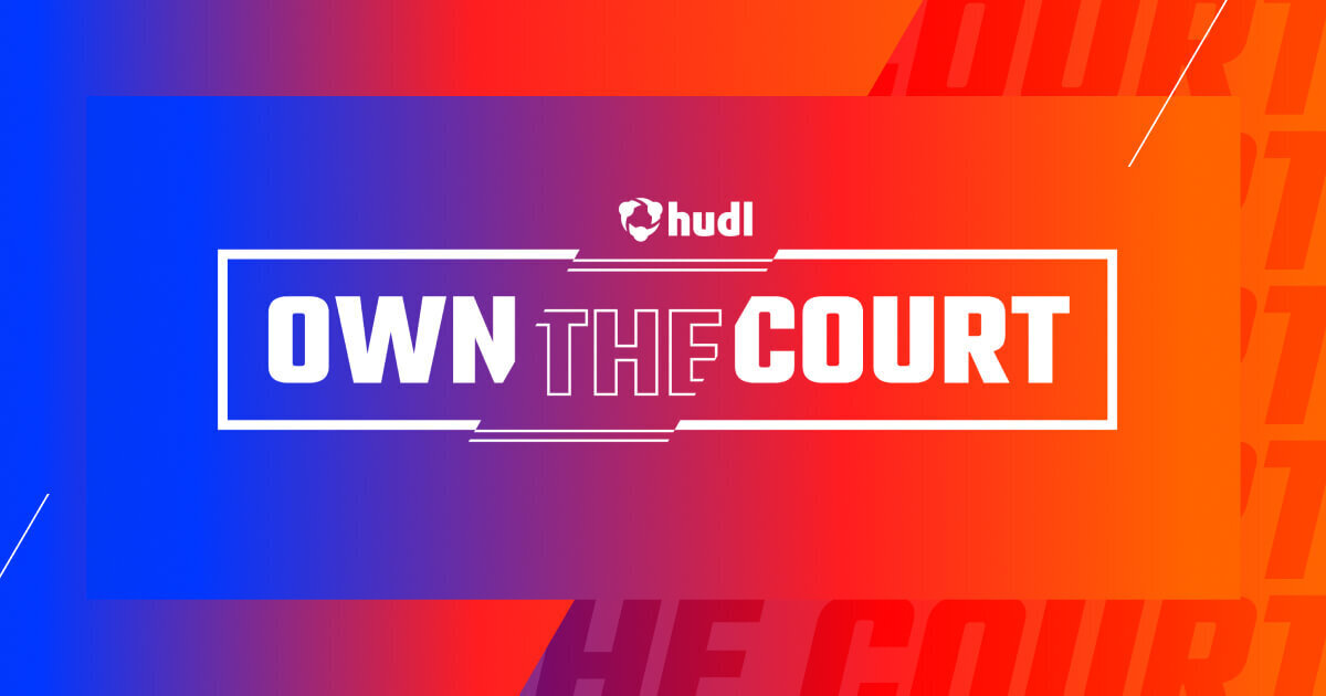A gradient background that transitions from blue on the left to orange and red on the right. In the center, enclosed within a thin white rectangular outline, is the bold white text "OWN THE COURT". Above this text, the word "Hudl" with its logo centrally placed. Faint, diagonal lines run across the background, and the words "THE COURT" are subtly repeated in a faint, large font multiple times in the background on the right side.