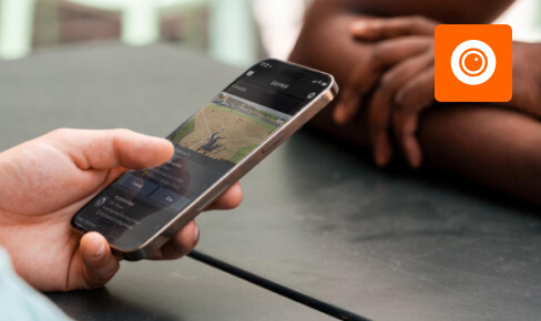 A coach using a smatphone to manage Focus recording schedules in the Hudl Focus App